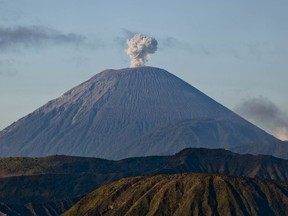 General view of the Bromo Tengger Semeru National Park, with Mount Rinjani in the distance on July 23, 2013 in Probolinggo, Indonesia.