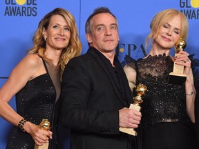 In this file photo taken on January 7, 2018 (L-R) Actress Laura Dern, director Jean-Marc Vallee and acttress Nicole Kidman pose with the Best Television Limited Series or Motion Picture Made for Television throphy for 'Big Little Lies'during the 75th Golden Globe Awards in Beverly Hills, California