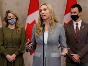 Minister of Sport Pascale St-Onge, centre, whose absence from the Winter Olympics will teach China a solemn lesson about abusing human rights.