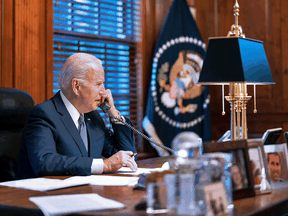 U.S. President Joe Biden speaks by phone to his Russian counterpart Vladimir Putin amid soaring Russia-West tensions over Ukraine, in Wilmington, Delaware, on December 30, 2021.