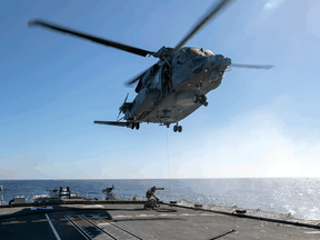 The Cyclone helicopter that crashed off the coast of Greece on April 29, 2020 is shown about two months earlier operating from HMCS Frederiction. Six Canadian Forces members died in the crash.