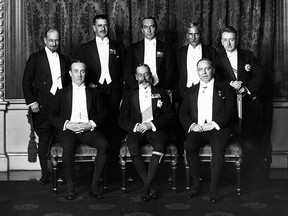 King George V of England, seated centre, poses with the prime ministers of countries participating in the Empire Conferences in 1926, five years before the Statute of Westminster created the British Commonwealth of Nations. Canadian prime minister William Lyon Mackenzie King is seated to the right, while British prime minister Stanley Baldwin is seated to the left. Standing are Rt. Hon. Walter Stanley Monroe (Newfoundland), Rt. Hon. Gordon Coates (New Zealand), Rt. Hon. Stanley Bruce (Australia), Rt. Hon. J. B. M. Hertzog (Union of South Africa) and W.T. Cosgrave (Irish Free State).