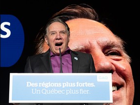 Quebec Premier François Legault, who invoked the notwithstanding clause in order to pass the province's controversial secular law, Bill 21, speaks at the end of a party meeting marking the 10th anniversary of the Coalition Avenir Québec, on Nov. 14, 2021.