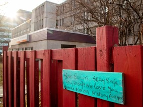 A sign supports seniors outside Camilla Care Community after new provincial rules suspending visitations at long term care homes too effect, in Mississauga, December 30, 2021.