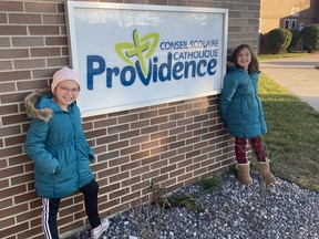 Jelena Riberdy and her children are happy they found a supportive community in their Providence school. Note: this photo was taken prior to the pandemic.