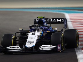 Nicholas Latifi of Canada driving the Williams Racing FW43B Mercedes during the F1 Grand Prix of Abu Dhabi at Yas Marina Circuit on Dec. 12, 2021. He would crash in the 52nd lap.