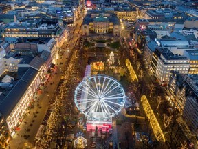 An aerial view taken on November 15, 2021 shows the city's main Christmas market 'Christmas in Winterland' in Spikersuppa in the centre of Oslo, near the Norwegian Parliament Stortinget