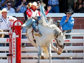 Richmond Champion rides Make Up Face during a bareback event at the Calgary Stampede on July 12, 2021. Forty-nine per cent of respondents to a national poll said they would feel comfortable living in Alberta, while only 24 per cent said they would feel comfortable living in Quebec.
