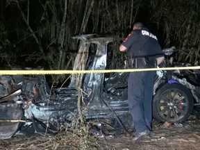 The remains of a self-driving Tesla vehicle are seen after it crashed in The Woodlands, Texas, killing its two male passengers on April 17, 2021. The U.S. National Highway Transportation Safety Administration is investigating a string of serious accidents involving autonomous vehicles.
