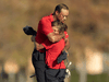 Tiger Woods and son Charlie Woods hug after the final round of the PNC Championship golf tournament at Grande Lakes Orlando Course.J