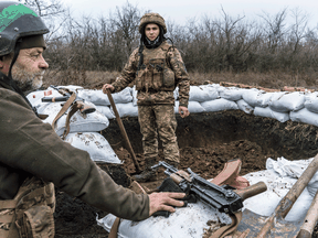 Ukrainian soldiers build a bunker on the front line on December 12, 2021 in Zolote, Ukraine. A build-up of Russian troops along the border with Ukraine has heightened worries that Russia intends to invade the Donbas region.