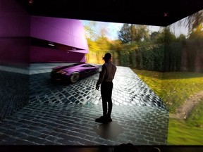 The VR CAVE in Windsor is a specially designed visualization space that creates an immersive virtual environment for running simulations like virtual drive scenarios. This uses a simulator while wearing VR glasses strapped into VR headsets and sensors. PHOTO COURTESY OF INVEST WINDSORESSEX