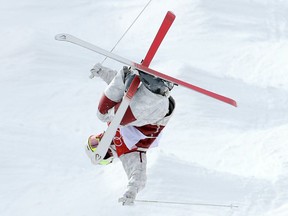 Mikael Kingsbury of Canada in his first run of mogul qualification at the 2018 Winter Olympics in South Korea, on Feb. 09, 2018.  Photo by Jean Levac/Postmedia