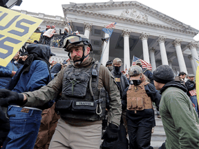 Members of the Oath Keepers are seen among supporters of U.S. President Donald Trump who stormed the U.S. Capitol during a protest against the certification of the 2020 U.S. presidential election results by the U.S. Congress, January 6, 2021.