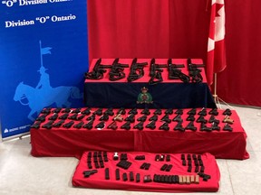 An arsenal of illegal guns from the United States seized last month near Cornwall, Ont. If a suite of Liberal Criminal Code reforms pass, mandatory minimum sentences will be stripped from 10 common Canadian firearms offences, including some related to weapons trafficking.