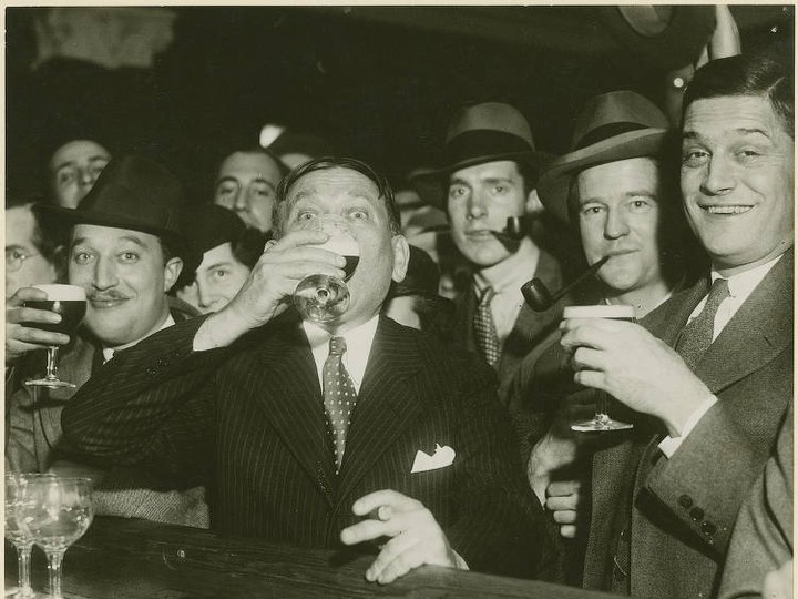  H.L. Mencken pictured 10 years later in 1933 taking his first drink of post-Prohibition beer.