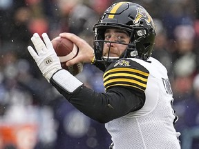 Hamilton Tiger-Cats quarterback Dane Evans (9) passes against the Toronto Argonauts during the first half of the Canadian Football League Eastern Conference Final game at BMO Field.