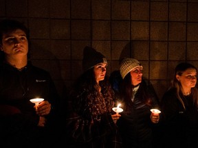 A prayer vigil is held at a church where community members prayed for the community and the families of those killed and injured after a deadly shooting at Oxford High School in Oxford, Mich., on Nov 30.