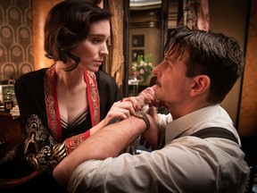 Rooney Mara and Bradley Cooper in Nightmare Alley.