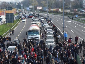 Serbian environmental activists block a highway to protest against laws on referendum and expropriation in Belgrade, Serbia, November 27, 2021. REUTERS/Zorana Jevtic