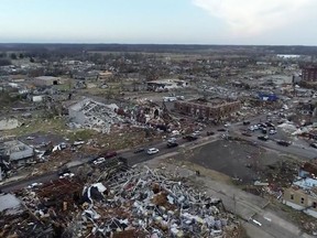 Aerial view of damage after a tornado tore through, in Mayfield, Kentucky, U.S., December 11, 2021, in this still image taken from a video. Video taken with a drone. Michael Gordon/Storm Chasing Video via REUTERS   ATTENTION EDITORS -  THIS IMAGE HAS BEEN SUPPLIED BY A THIRD PARTY. MANDATORY CREDIT. NO RESALES. NO ARCHIVES. NO NEW USES AFTER JANUARY 9, 2022. NO USE: NETWORK NEWS SERVICE, CBS NEWS, CNN, NBC NEWS, WEATHER NATION, WEATHER CHANNEL, WEATHER.COM, ACCU WEATHER CHANNEL, YOUTUBE