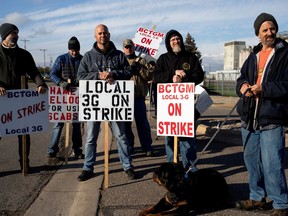 A group of union workers from Kellogg's picket outside the cereal maker's headquarters as they remain on strike in Battle Creek, Michigan, U.S., October 21, 2021.