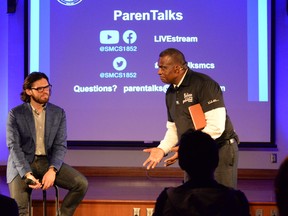 ParenTalks regular medical contributor Dr. Mark Broussenko and Karl Subban, school principal, address SMCS parents during an in-person event. SUPPLIED