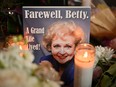 Flowers, candles and mementos cover the star of late US actress Betty White on the Hollywood Walk of Fame, December 31, 2021 in Hollywood, California