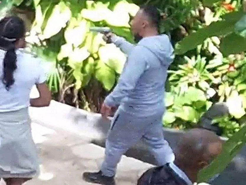 A man wielding a gun was caught on CCTV at the Xcaret Hotel, located in Playa del Carmen, Mexico. 

