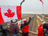 Supporters of Freedom Convoy 2022 gather on an overpass over the Trans-Canada Highway east of Calgary on Monday, January 24, 2022.