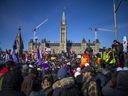 Protesters gathered around Parliament Hill and the downtown core for the Freedom Convoy protest that made their way from various locations across Canada, Sunday January 30, 2022. 