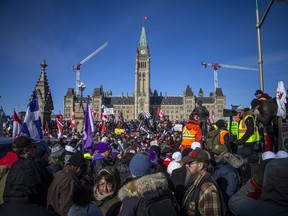Protesters gathered around Parliament Hill and the downtown core for the Freedom Convoy protest that made their way from various locations across Canada, Sunday January 30, 2022.