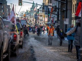 Streets and sidewalks Sunday continued to be choked in downtown Ottawa, but police say they are helping people who want to exit the city after Freedom Convoy events this weekend.