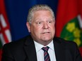 Ontario Premier Doug Ford holds a press conference regarding the plan for Ontario to open up at Queen's Park during the COVID-19 pandemic in Toronto, on May 20, 2021.