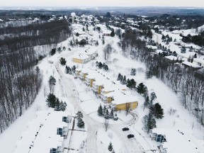 After walking the snowshoe trails that skirt the 30-acre Carriage Country Club, just outside of Barrie, residents can huddle around firepits situated throughout the grounds.