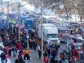 Big rigs and their supporters descend on Parliament Hill on January 29, 2022.