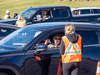 Drivers show identification to provincial workers at the Confederation Bridge in P.E.I., on July 7, 2020 during the “Atlantic Bubble” which helped limit the spread of COVID-19 in Canada’s Atlantic provinces.