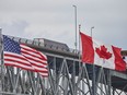 A truck crosses the Bluewater Bridge between Sarnia, Ont., and Port Huron, Mich., in a file photo from Aug. 16, 2020. Canadian citizens are being stranded in the U.S. as a result of Liberal government policies that Sabrina Maddeaux says are unreasonable if not unconstitutional.