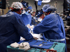 A surgical team conducts a successful transplant of a genetically-modified pig heart on David Bennett, a 57-year-old patient with terminal heart disease, at University of Maryland Medical Center in Baltimore, Maryland, January 7, 2022.