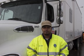 DeAndre Mahadeo, a 35-year-old trucker from Barrie, before the convoy begins. Credit: Rachel Parent/National Post