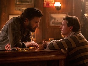 "Take care of your mother and don’t drink your stashies!" Ben Affleck and Tye Sheridan in The Tender Bar.