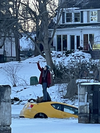 This woman was seen driving her car recklessly on the Rideau River on Sunday afternoon before it broke through thin ice on the outskirts of Ottawa. A bystander then captured this image of the woman taking a selfie from the sinking vehicle as locals coordinated her rescue via kayak.