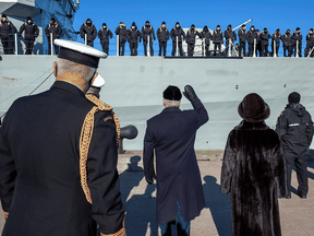Nova Scotia Lt-Gov.  Arthur LeBlanc, with his wife Patsy, waves to the crew as HMCS Montreal departs Halifax for a six-month deployment on a NATO mission to the Mediterranean Sea, Wednesday, January, 2022.