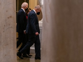 President Joe Biden, left, arrivesat the U.S. Capitol on the first anniversary of the deadly insurrection at the U.S. Capitol in Washington, D.C., U.S., on Thursday, Jan. 6, 2022.