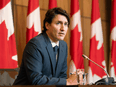 Prime Minister Justin Trudeau speaks during a news conference on January 19, 2022 in Ottawa. On Friday, Trudeau announced Canada would loan $120 million to Ukraine. Trudeau said it was one of the "top things" Ukrainian officials asked for in their discussions with Foreign Affairs Minister Melanie Joly this week.