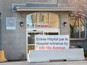 The emergency department entrance at the Lachine Hospital in Montreal is seen on Nov. 14, 2021, after it was forced to close overnight to handle an influx of COVID patients.