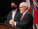 Dr. Kieran Moore, Ontario's Chief Medical Officer of Health, right, and Education Minister Stephen Lecce make an announcement on preparations for the return to in-person learning at schools during the COVID-19 pandemic in Toronto on Wednesday, January 12, 2022.