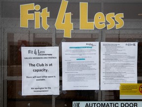 A closed Fit 4 Less gym is seen in Toronto on Jan. 5, after the Ontario government imposed new restrictions.