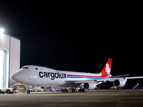 The first Boeing Co. 747-8 freighter painted in customer livery for Cargolux at the Boeing paint hangar in Everett, Washington, U.S., on Monday, June 7, 2010. A man was found in the wheel section under the front of a Cargolux freight plane at Amsterdam's Schiphol airport on Sunday. The flight had arrived from Africa.