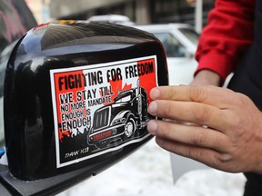 Truckers and their supporters were protesting vaccine mandates and other COVID measures for the eighth day in downtown Ottawa on Friday, Feb. 4.